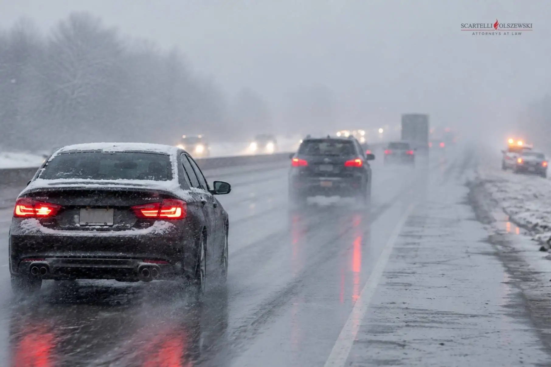 Driving car in rain, snow, and ice