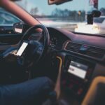 Distracted driver texting while in their car