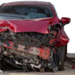 Red car in car accident