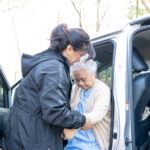 Caregiver supporting a senior
