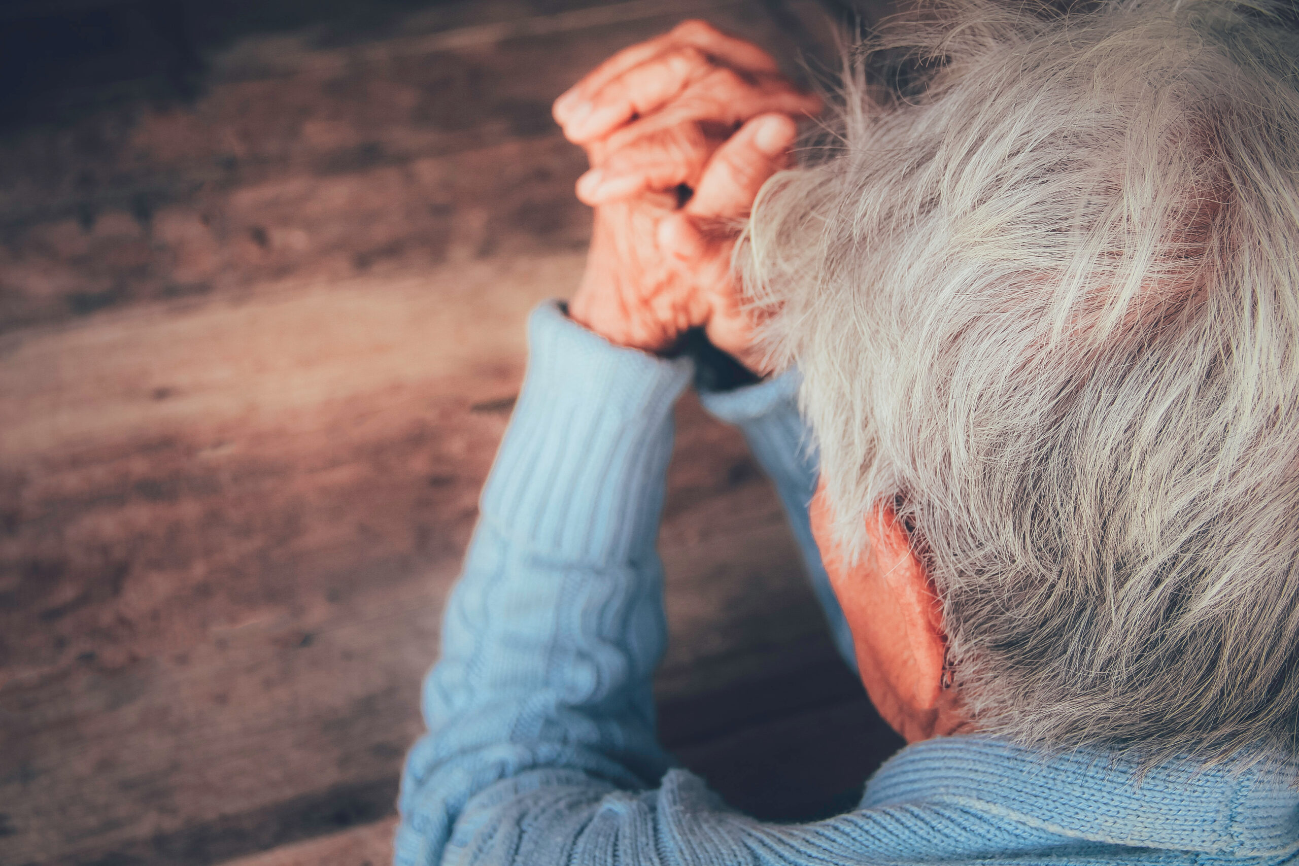 Senior citizen praying