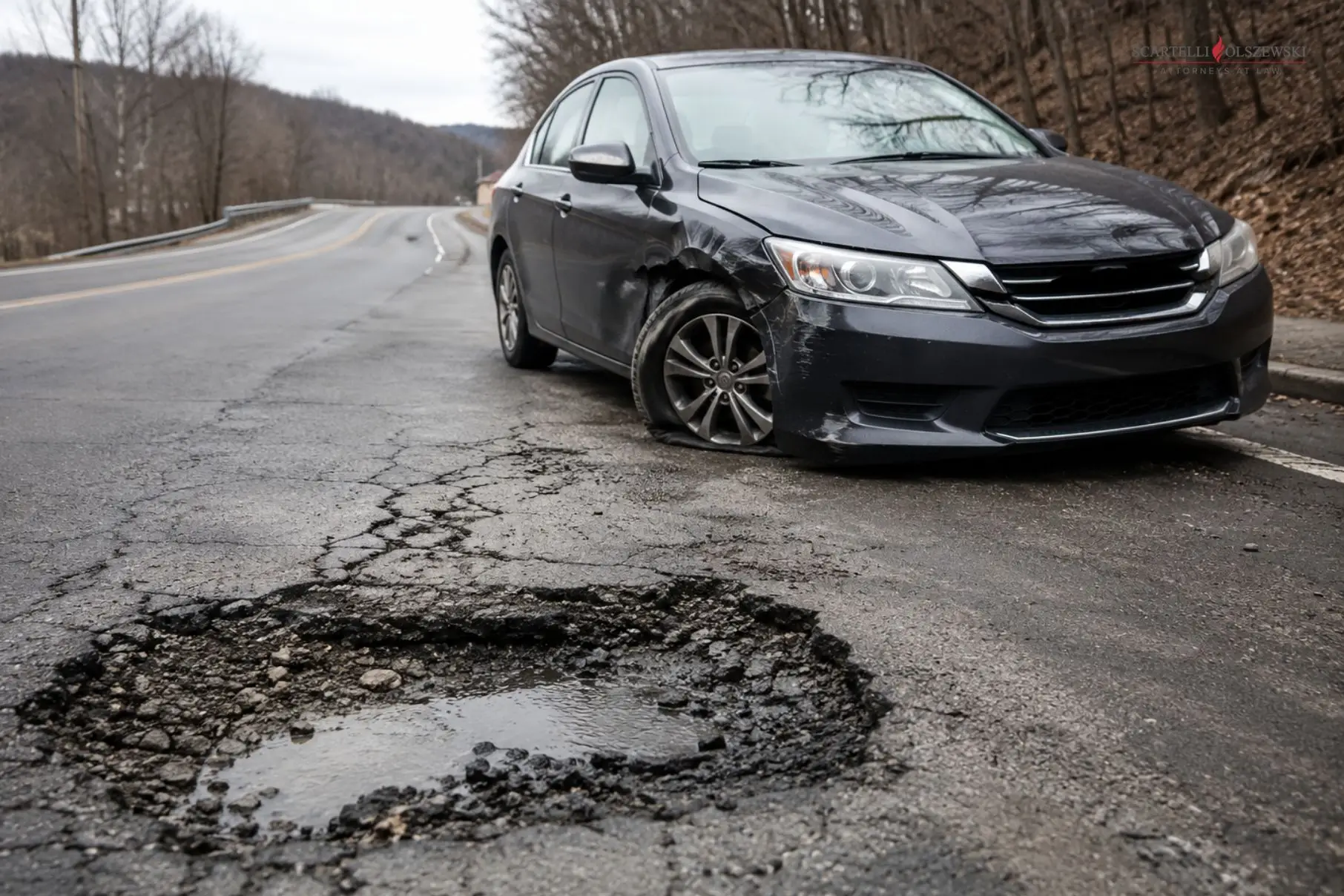 Hit By A Government Or Municipal Vehicle In Pennsylvania? You Have Only 6 Months To Act 3 Crashed due to a pothole or bad road instead of a vehicle